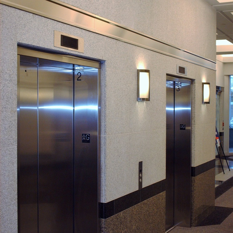Stainless steel elevator door trim.